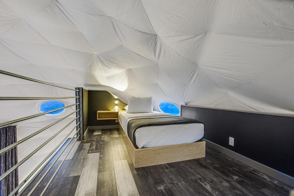 Postel nebo postele na pokoji v ubytování Udoscape Eco-Glamping Resorts