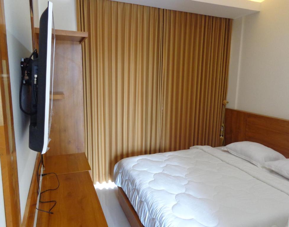 Postel nebo postele na pokoji v ubytování Diva Residence