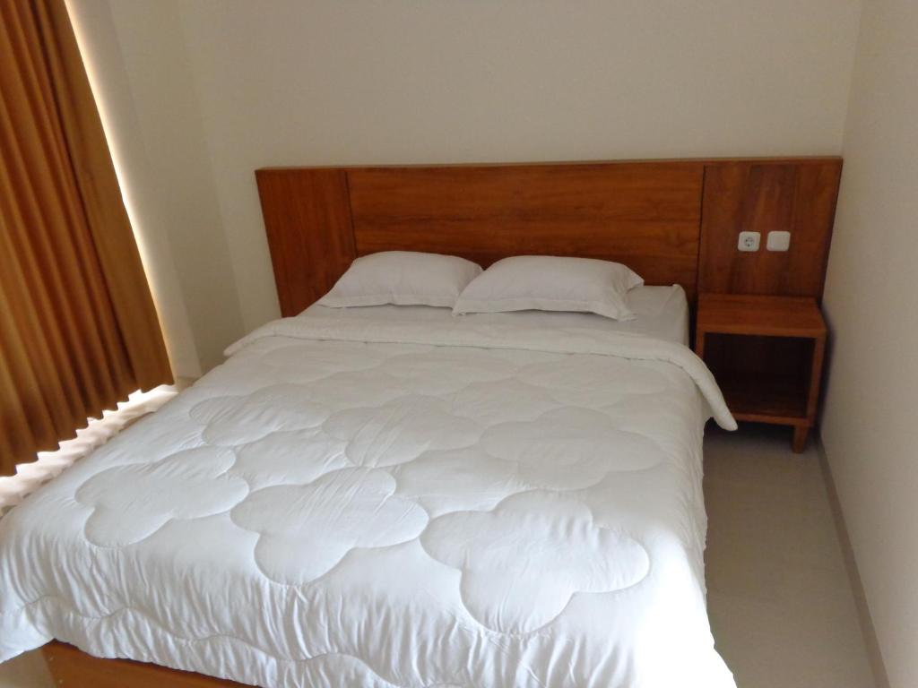 Postel nebo postele na pokoji v ubytování Diva Residence
