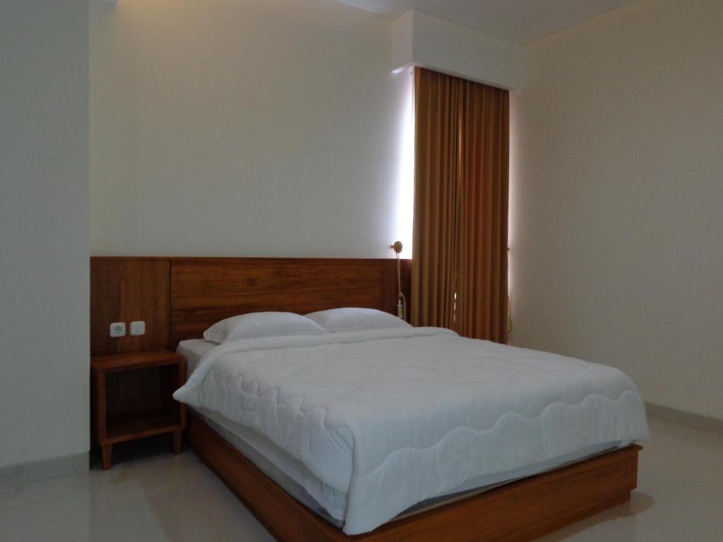 Postel nebo postele na pokoji v ubytování Diva Residence