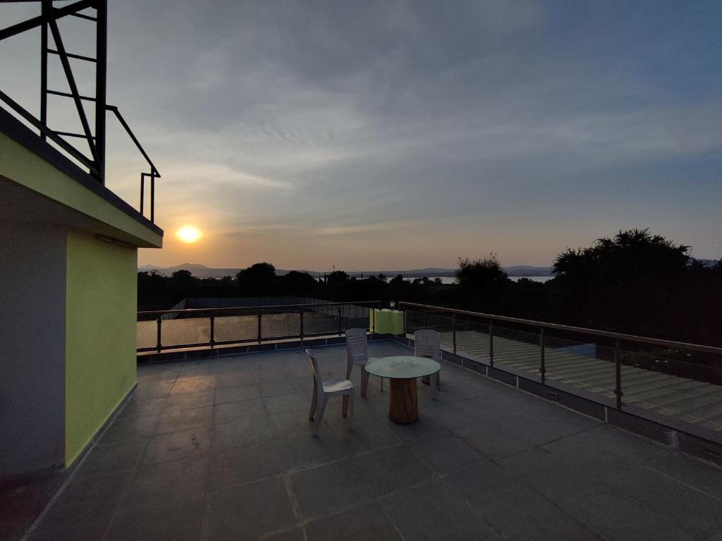 Východ nebo západ slunce při pohledu z bed and breakfast nebo okolí