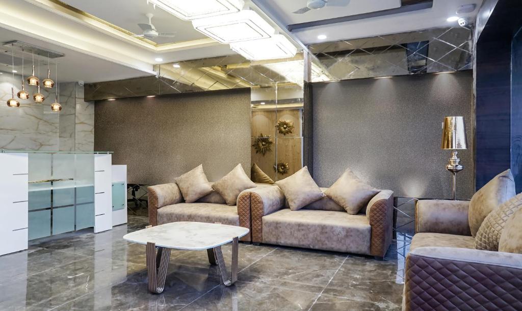 Posezení v ubytování Treebo Hotel A1