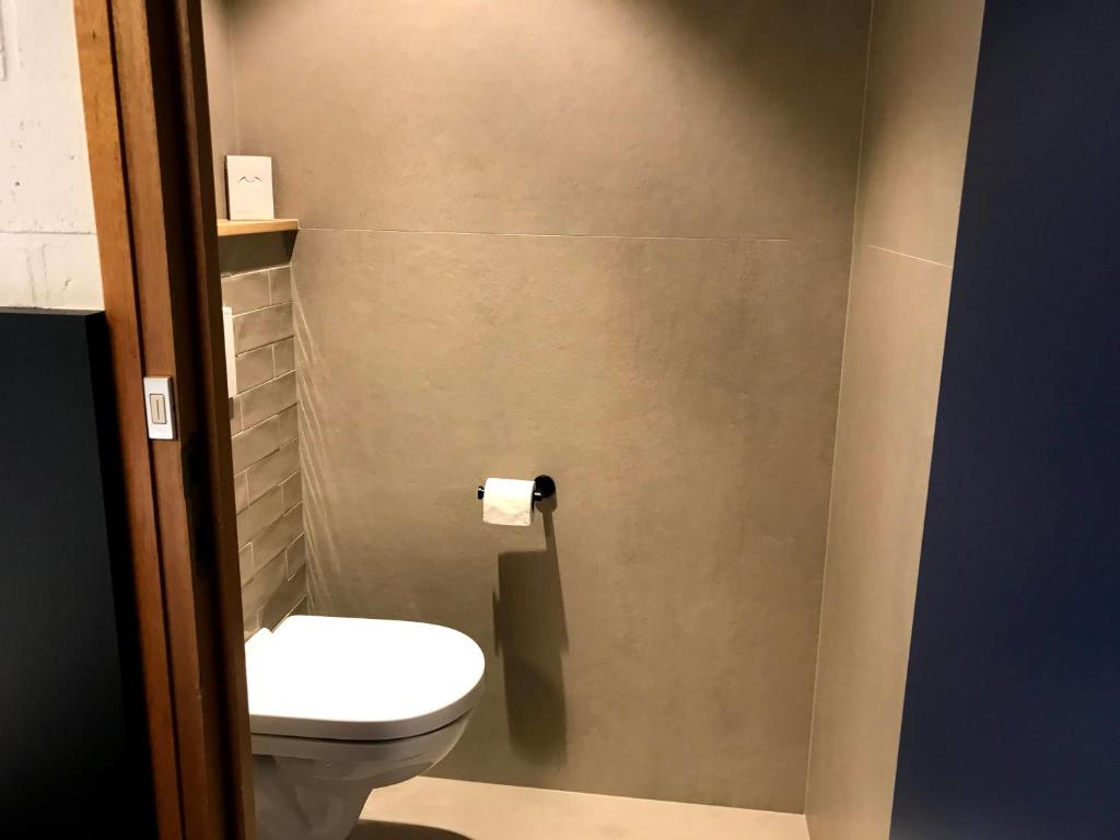 Koupelna v ubytování Vakantiedomein Hoge Duin