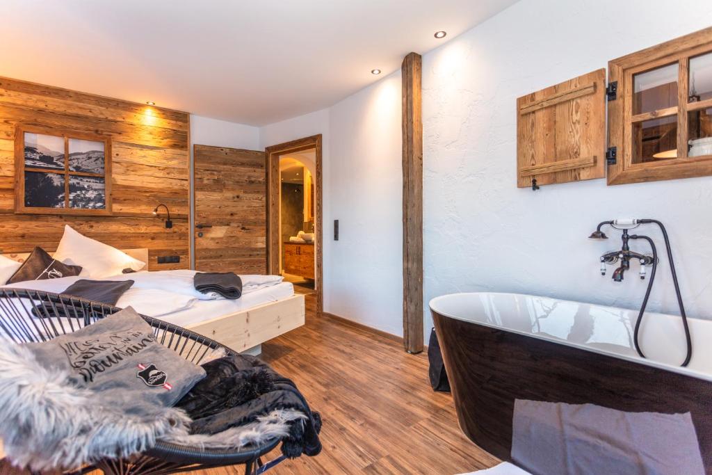 Postel nebo postele na pokoji v ubytování Hotel Sonnberg