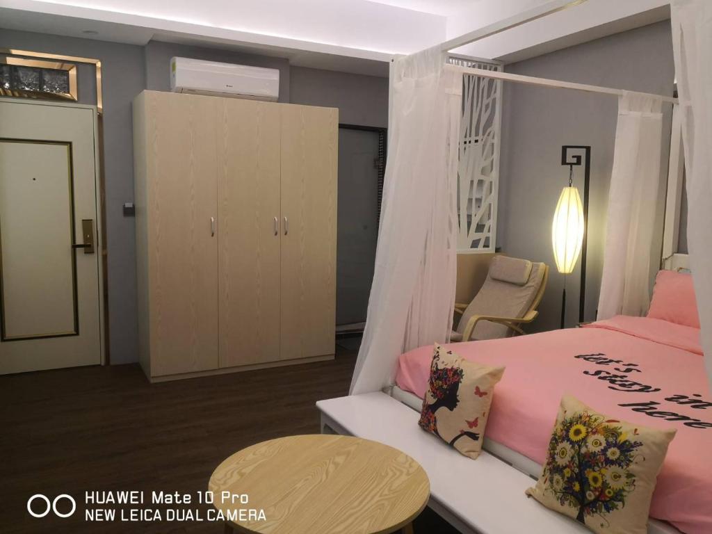 Voodi või voodid majutusasutuse Jiji Wu Homestay toas