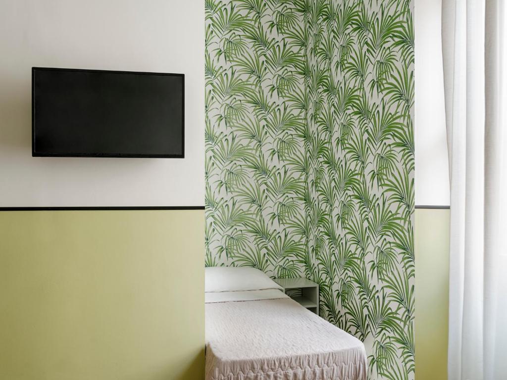 TV a/nebo společenská místnost v ubytování Hotel Riviera