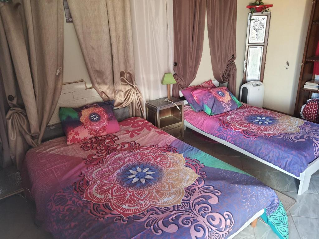 Postel nebo postele na pokoji v ubytování B&B Chambre Chante Cristal