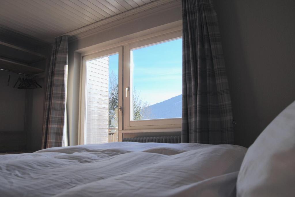 Postel nebo postele na pokoji v ubytování Hotel Speiereck