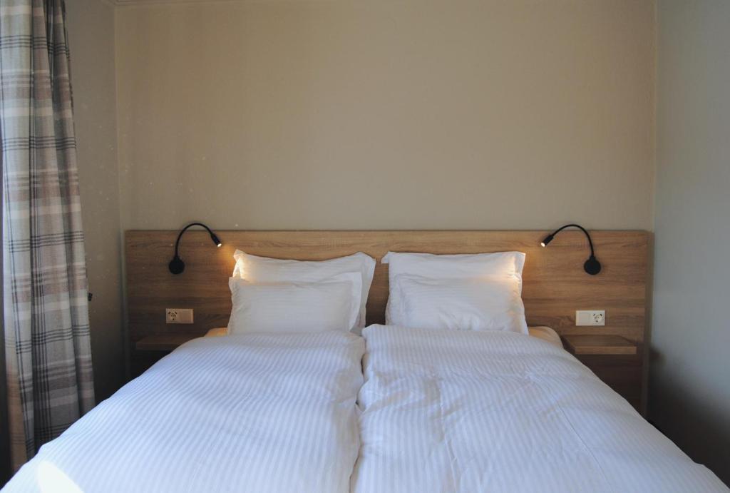 Postel nebo postele na pokoji v ubytování Hotel Speiereck