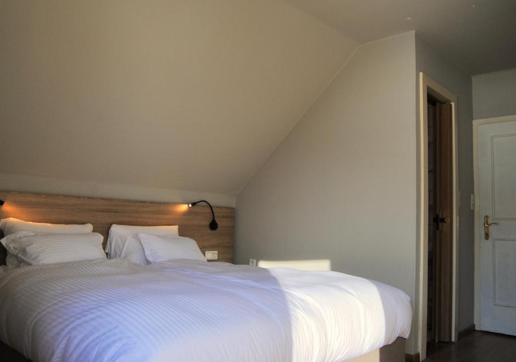 Postel nebo postele na pokoji v ubytování Hotel Speiereck