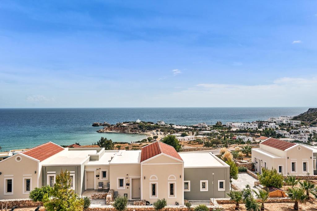 an image of a villa with the ocean in the background at Althea Boutique Hotel - Adults Only in Amoopi