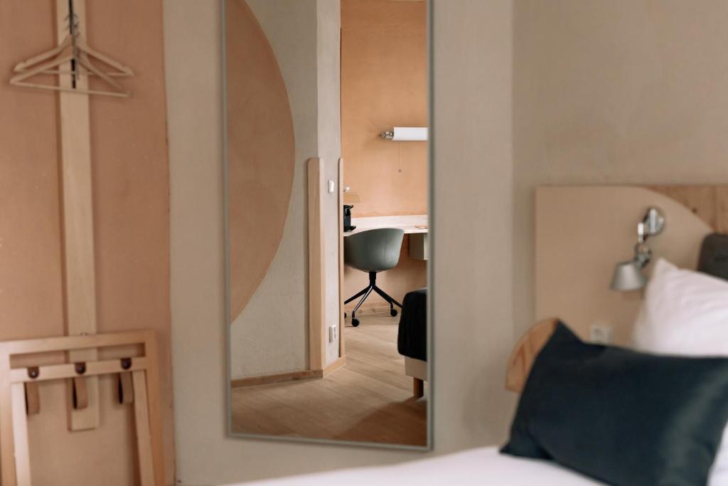 Postel nebo postele na pokoji v ubytování Asgard Hotel