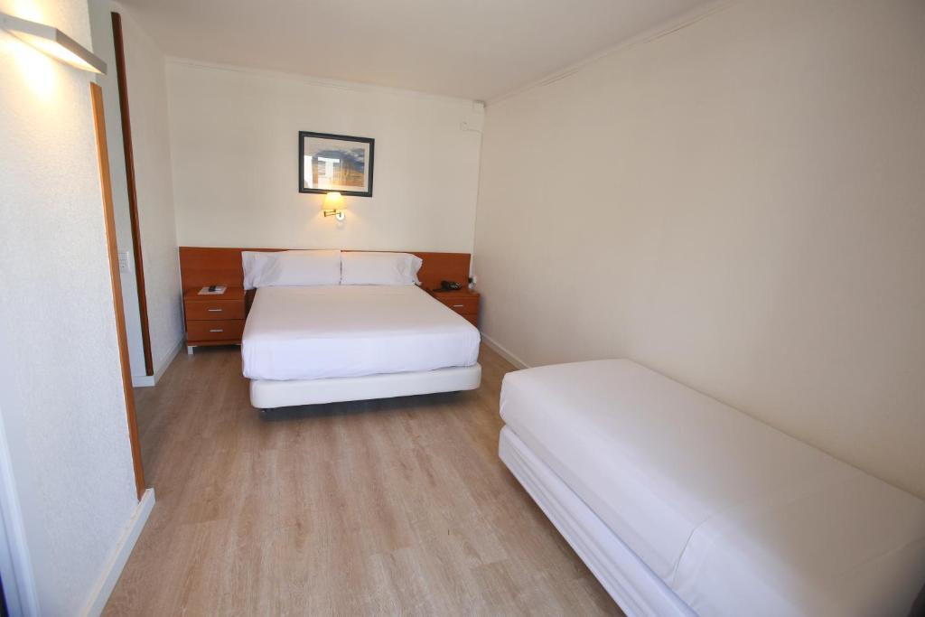 Postel nebo postele na pokoji v ubytování Solvi Hotel - Adults Only