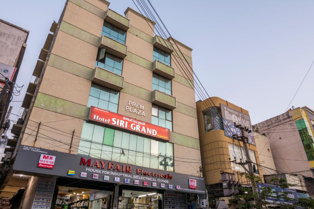 a building with a sign that reads mayfair park benefit at Hotel Siri Grand in Visakhapatnam