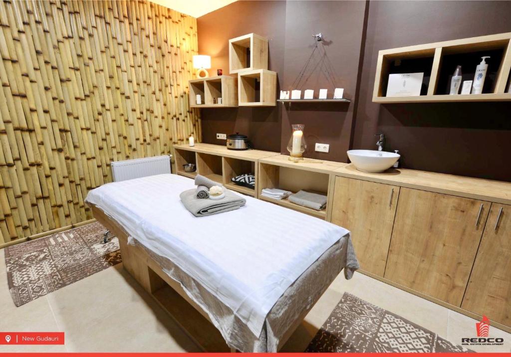 Postel nebo postele na pokoji v ubytování GVC 2-level apt New Gudauri