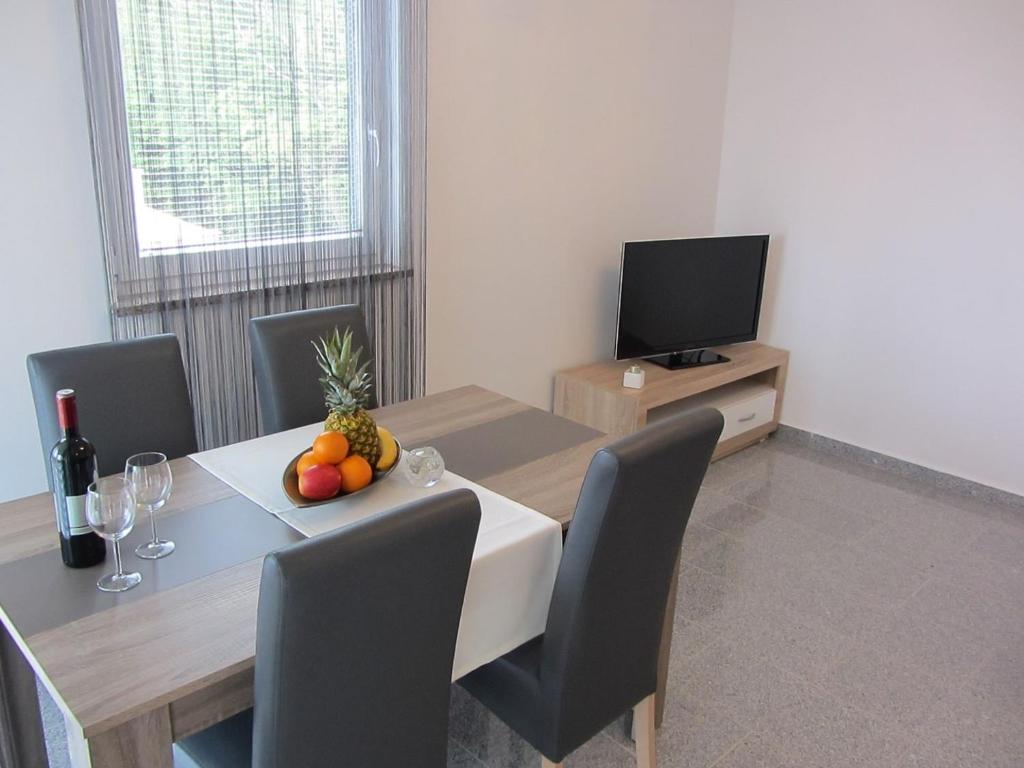 TV a/nebo společenská místnost v ubytování Apartment Tadić