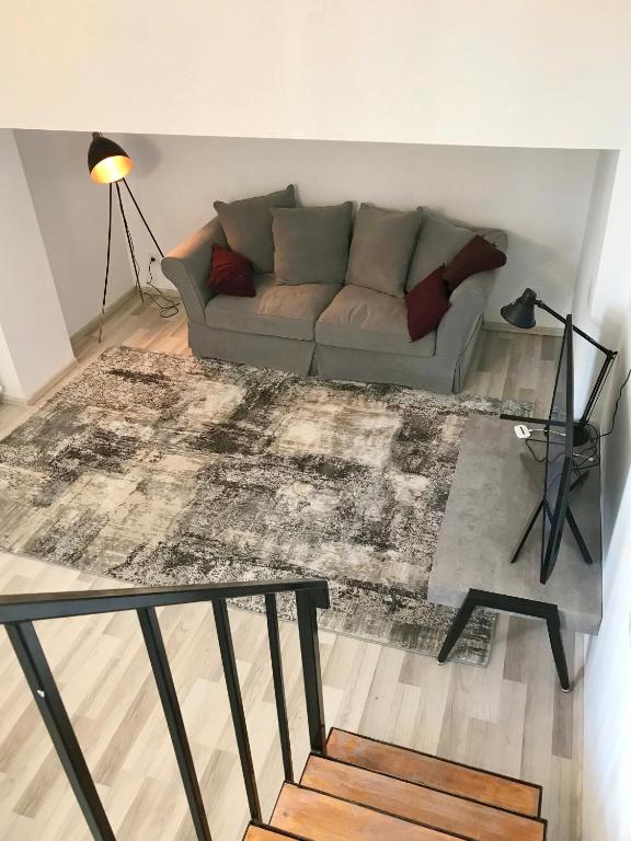Posezení v ubytování GVC 2-level apt New Gudauri
