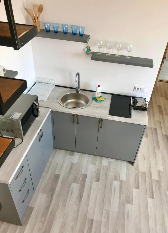 Kuchyň nebo kuchyňský kout v ubytování GVC 2-level apt New Gudauri