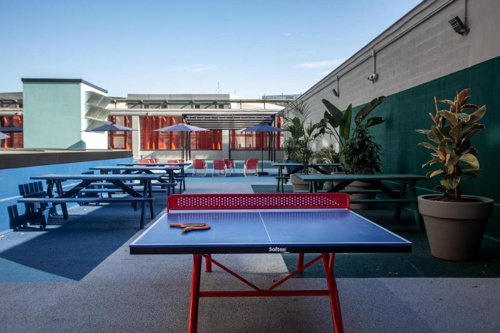 a ping pong table on the roof of a building at Residencia Universitaria Resa San Mamés in Bilbao