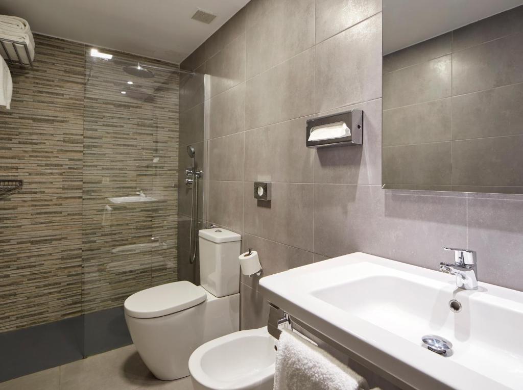 Koupelna v ubytování Hotel Avenida