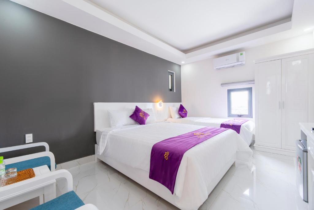Un ou plusieurs lits dans un hébergement de l'établissement Sen Hotel Phu Quoc