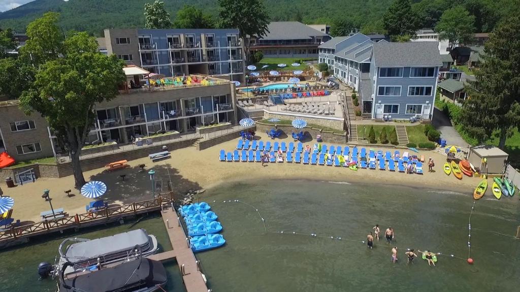 an aerial view of a beach with people in the water at Surfside On The Lake in Lake George