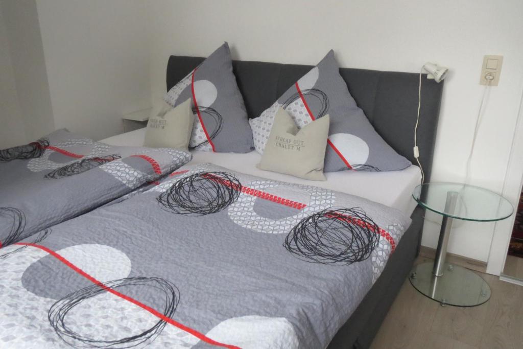 Postel nebo postele na pokoji v ubytování Chalet M