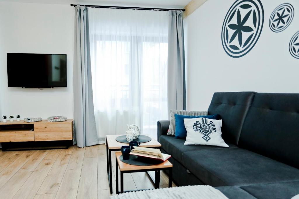 Posedenie v ubytovaní ZakoApartament Brzozowa