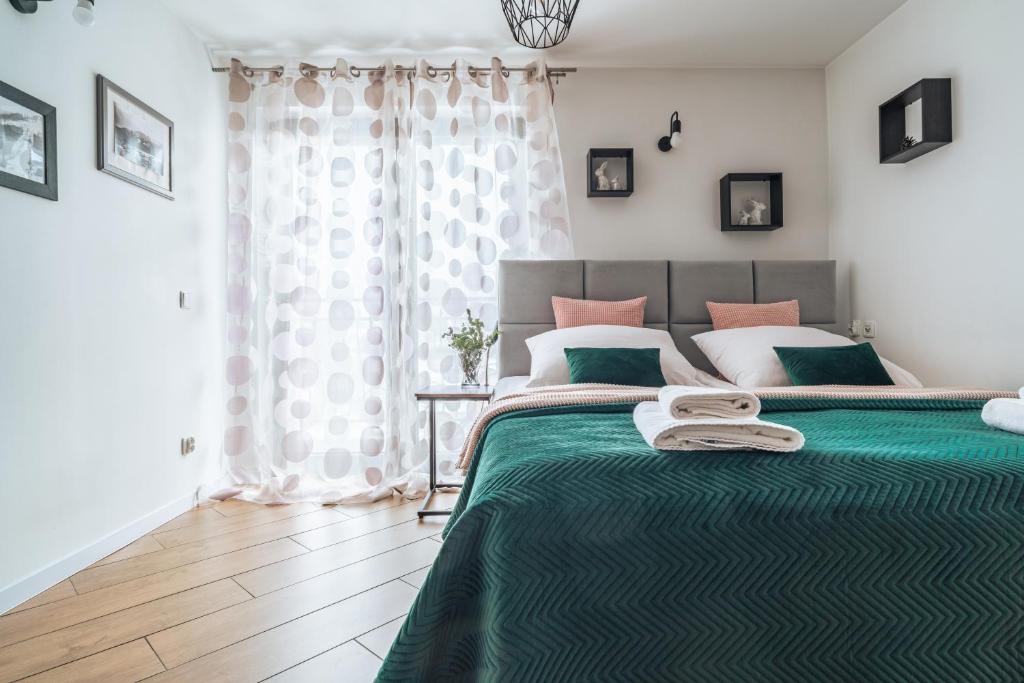 Posteľ alebo postele v izbe v ubytovaní Willa Gardenia