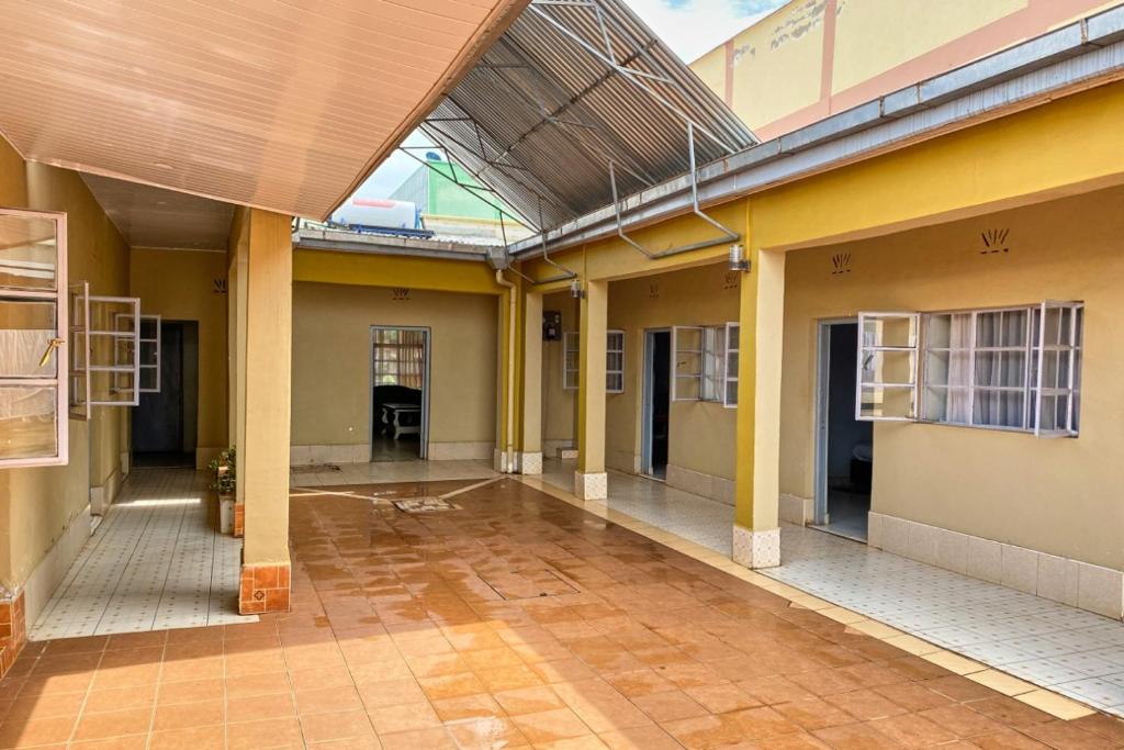 an empty hallway of a building with a glass ceiling at TULIA LODGE in Eldoret