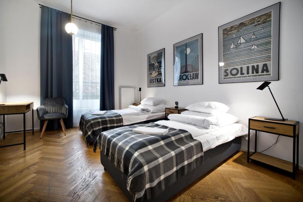 Posteľ alebo postele v izbe v ubytovaní P&O Apartments Warecka Street