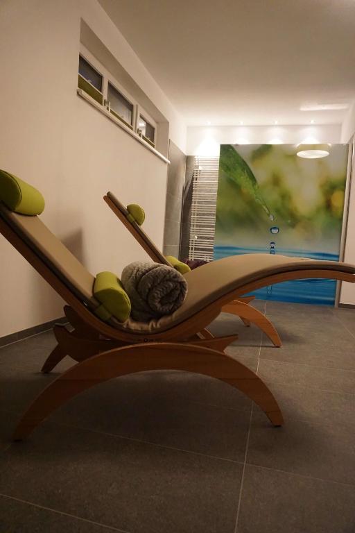 Televízia a/alebo spoločenská miestnosť v ubytovaní Appartements Blumenwiese