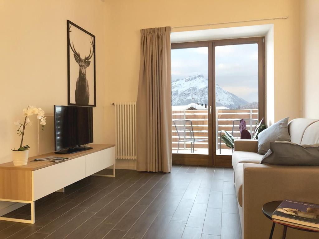 Telewizja i/lub zestaw kina domowego w obiekcie Residence Aurora