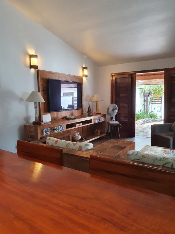  Linda casa a poucos metros da praia