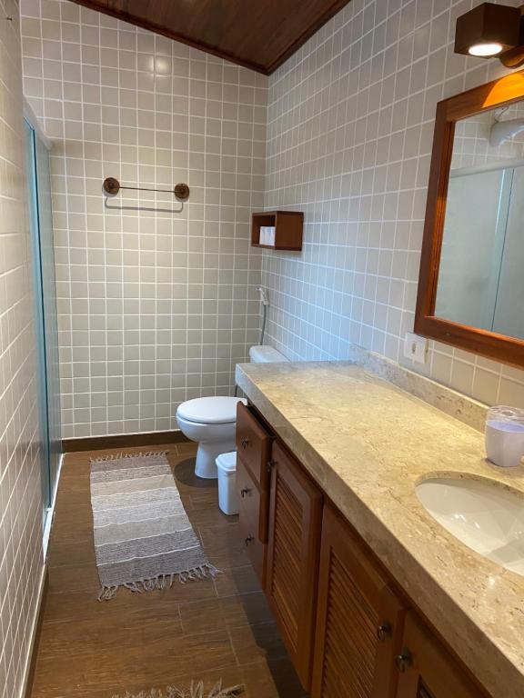  Linda casa a poucos metros da praia