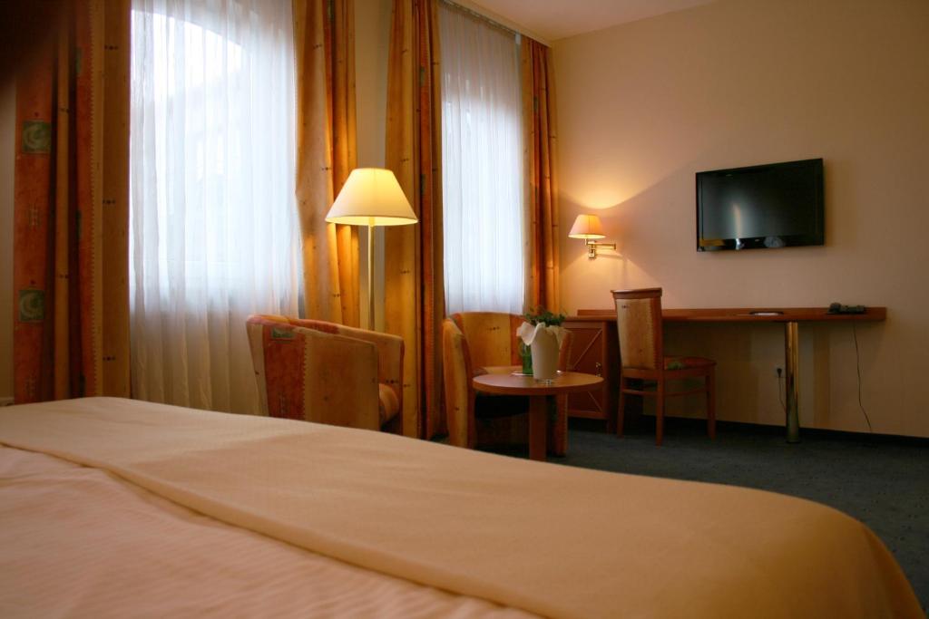 TV a/nebo společenská místnost v ubytování Hotel Wilhelmshöhe