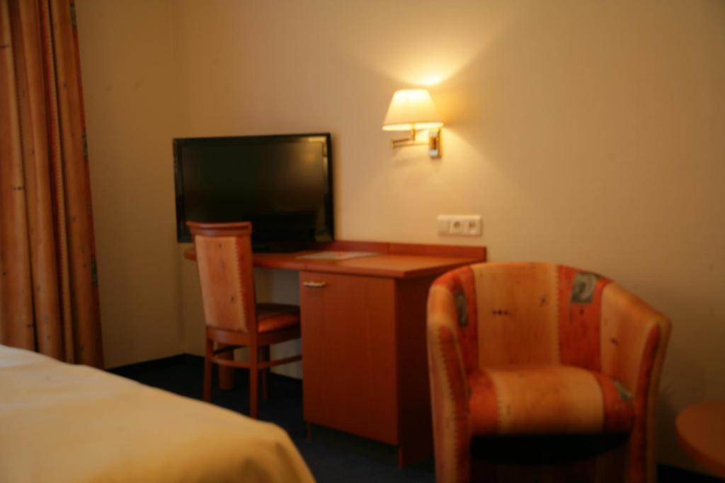 TV a/nebo společenská místnost v ubytování Hotel Wilhelmshöhe
