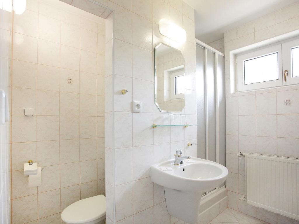 Łazienka w obiekcie Hotel Milan Vopicka