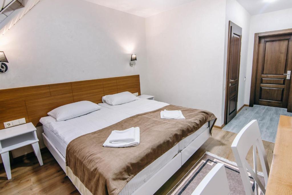 Postel nebo postele na pokoji v ubytování Diamond Resort Black