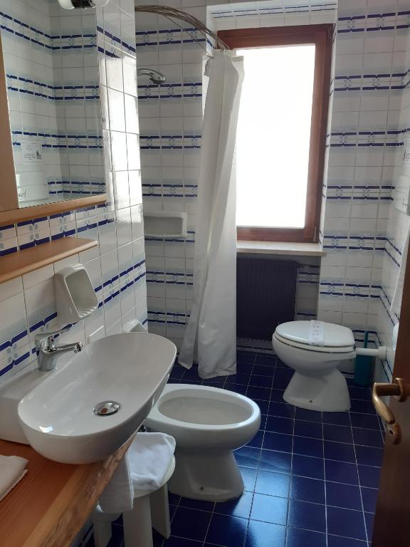 Koupelna v ubytování Garnì Valdan