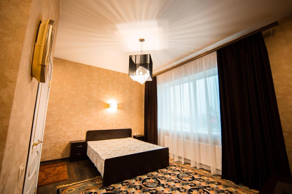 Кровать или кровати в номере Guest house Anatolik`s