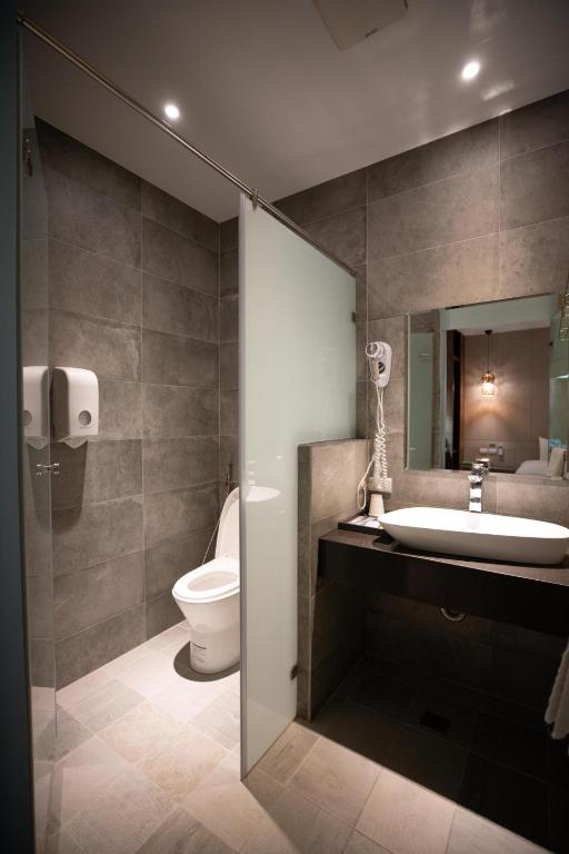 Koupelna v ubytování HUA B&B