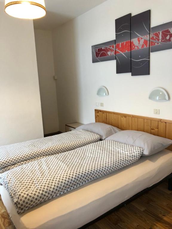 Postel nebo postele na pokoji v ubytování B&B Astor