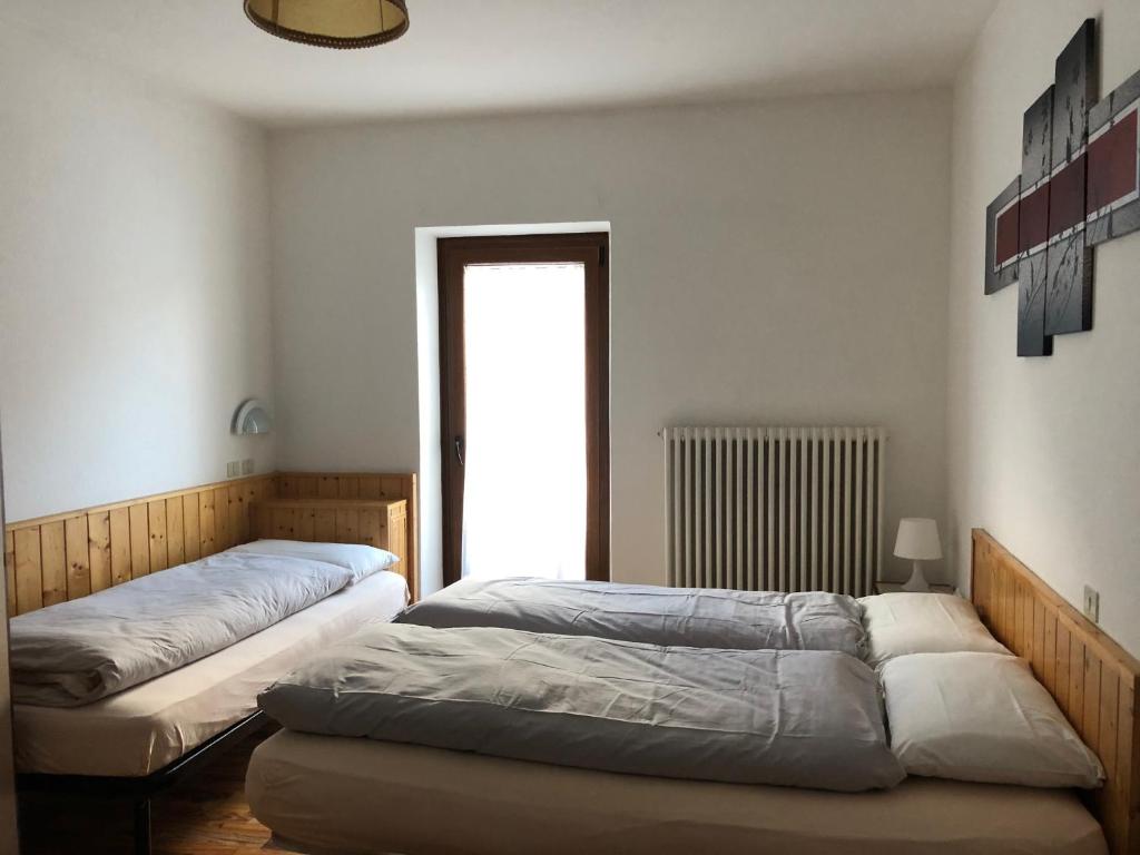 Postel nebo postele na pokoji v ubytování B&B Astor
