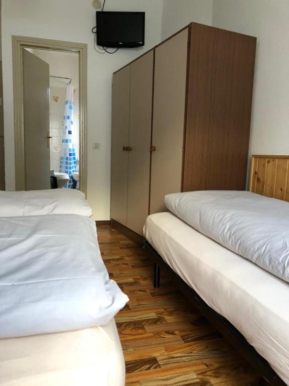 Postel nebo postele na pokoji v ubytování B&B Astor