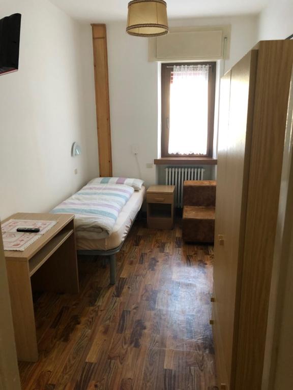 Postel nebo postele na pokoji v ubytování B&B Astor