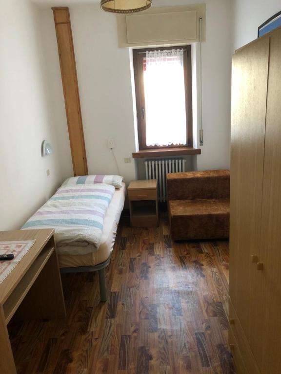 Postel nebo postele na pokoji v ubytování B&B Astor