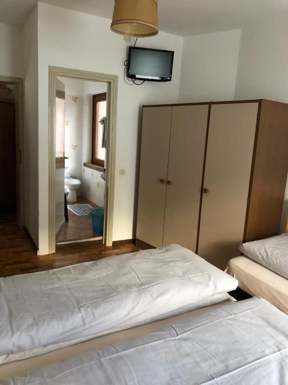 Postel nebo postele na pokoji v ubytování B&B Astor