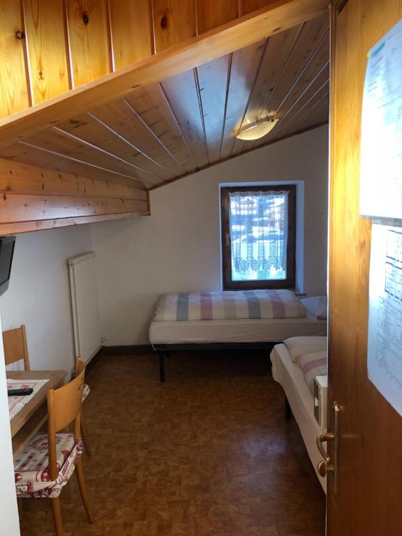 Postel nebo postele na pokoji v ubytování B&B Astor