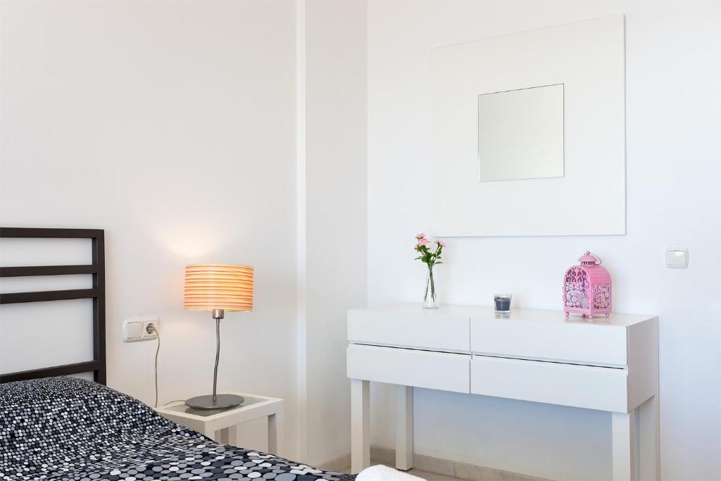 Posteľ alebo postele v izbe v ubytovaní Apartamento SAN FERMIN